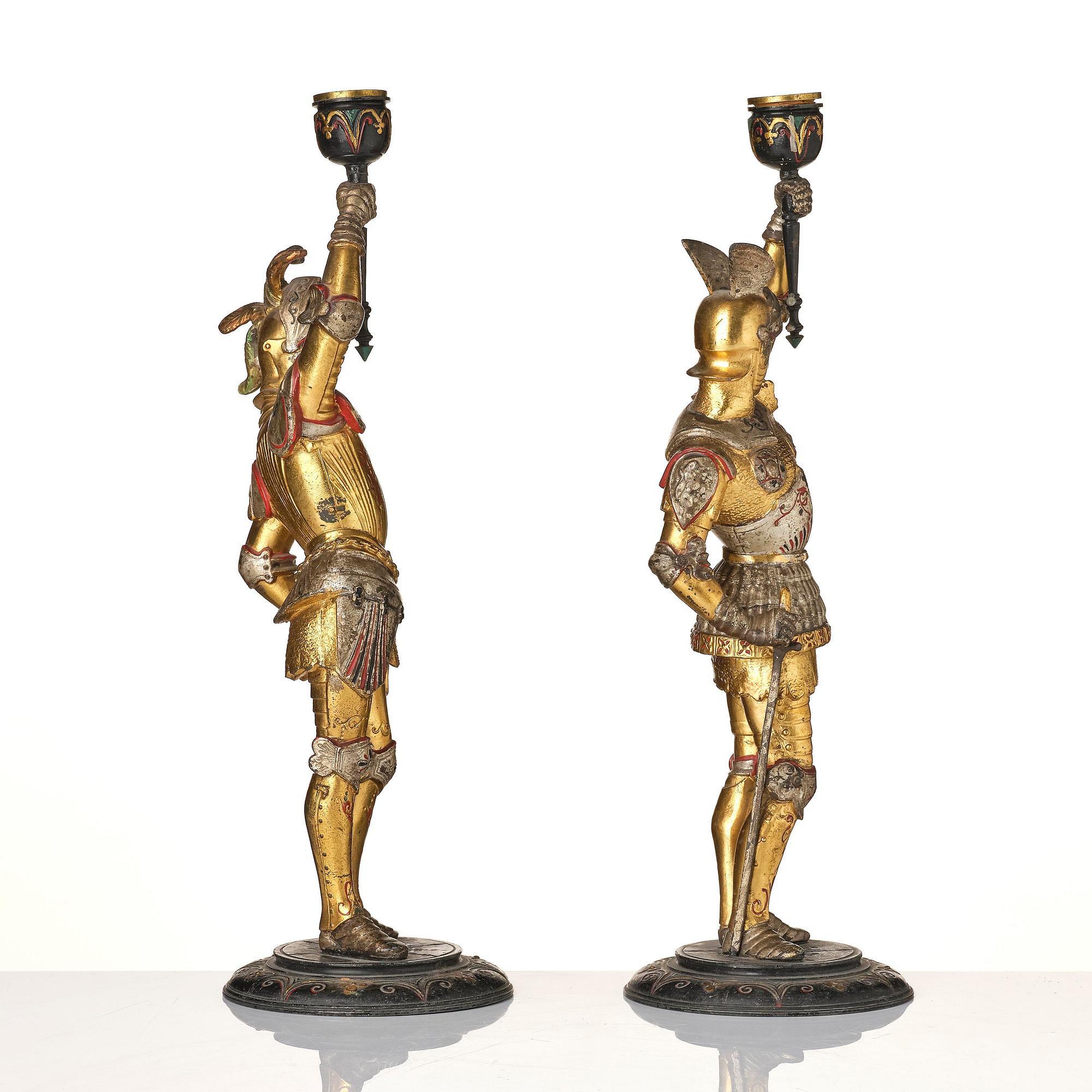 A pair of presumably German knights candlesticks, secound half 19th century.