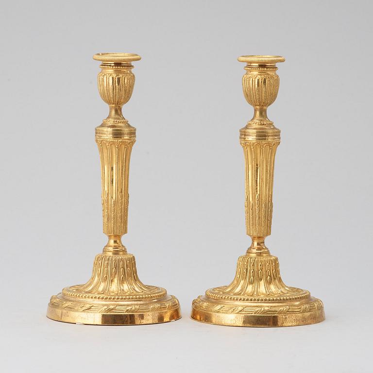 A pair of Louis XVI late 18th century candlesticks.