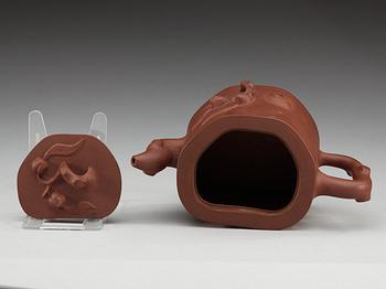 A Chinese Yixing tea pot with cover, 20th Century.