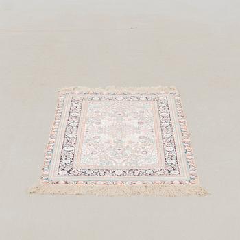 Oriental silk rug, approximately 122x72 cm.