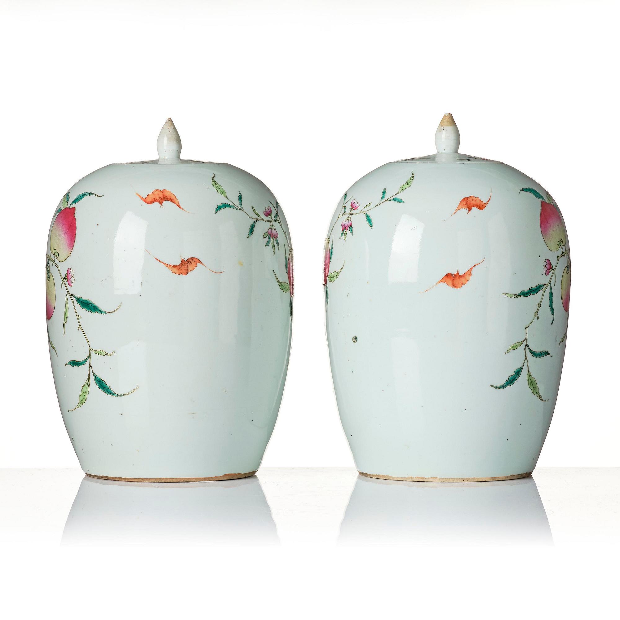 A pair of famille rose 'peaches' jars with cover, Qing dynasty, circa 1900.