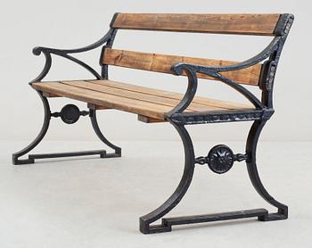 A Folke Bensow cast iron and stained wood park bench, Näfveqvarn.
