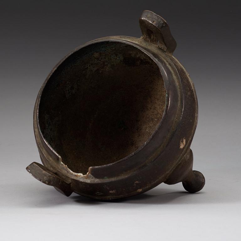 A bronze tripod censer, presumably Han dynasty (206 B.C-220 A.D).