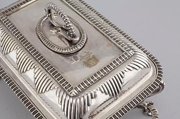 A silvered metal serving dish with rechaud, first half of the 20th century.