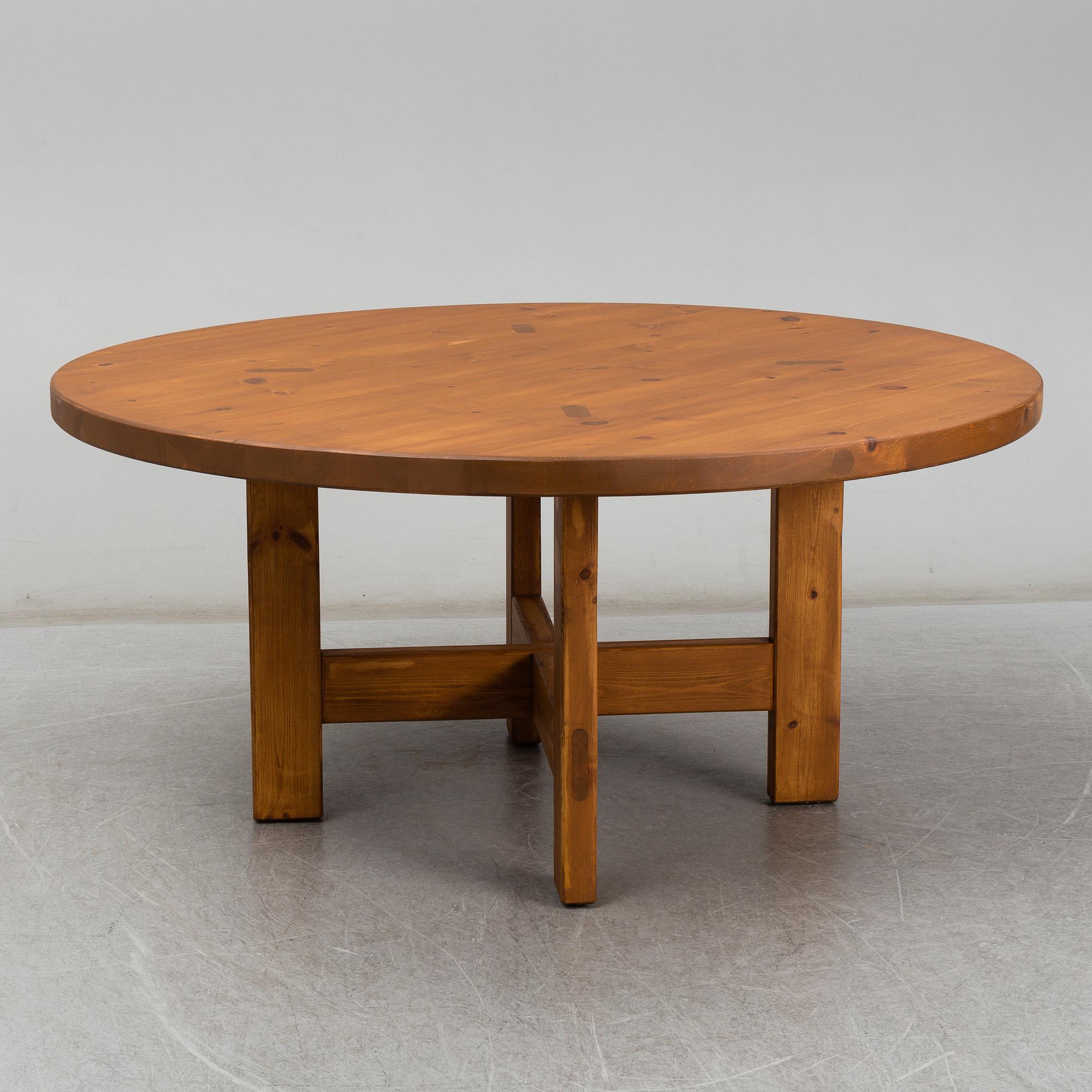 ROLAND WILHELMSSON, a pinewood dinner table, late 20th Century.