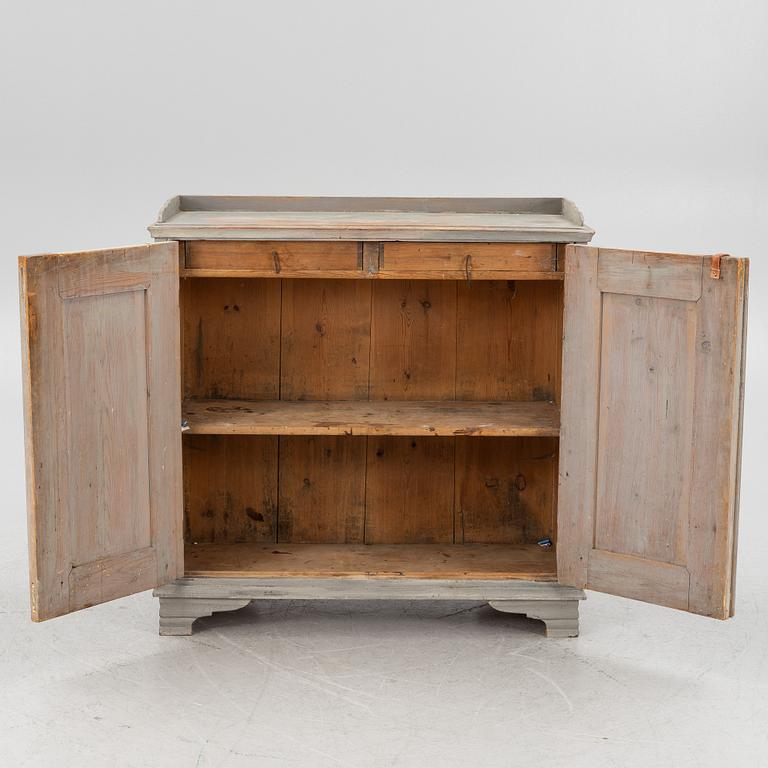 A Gustavian cupboard, circa 1800.