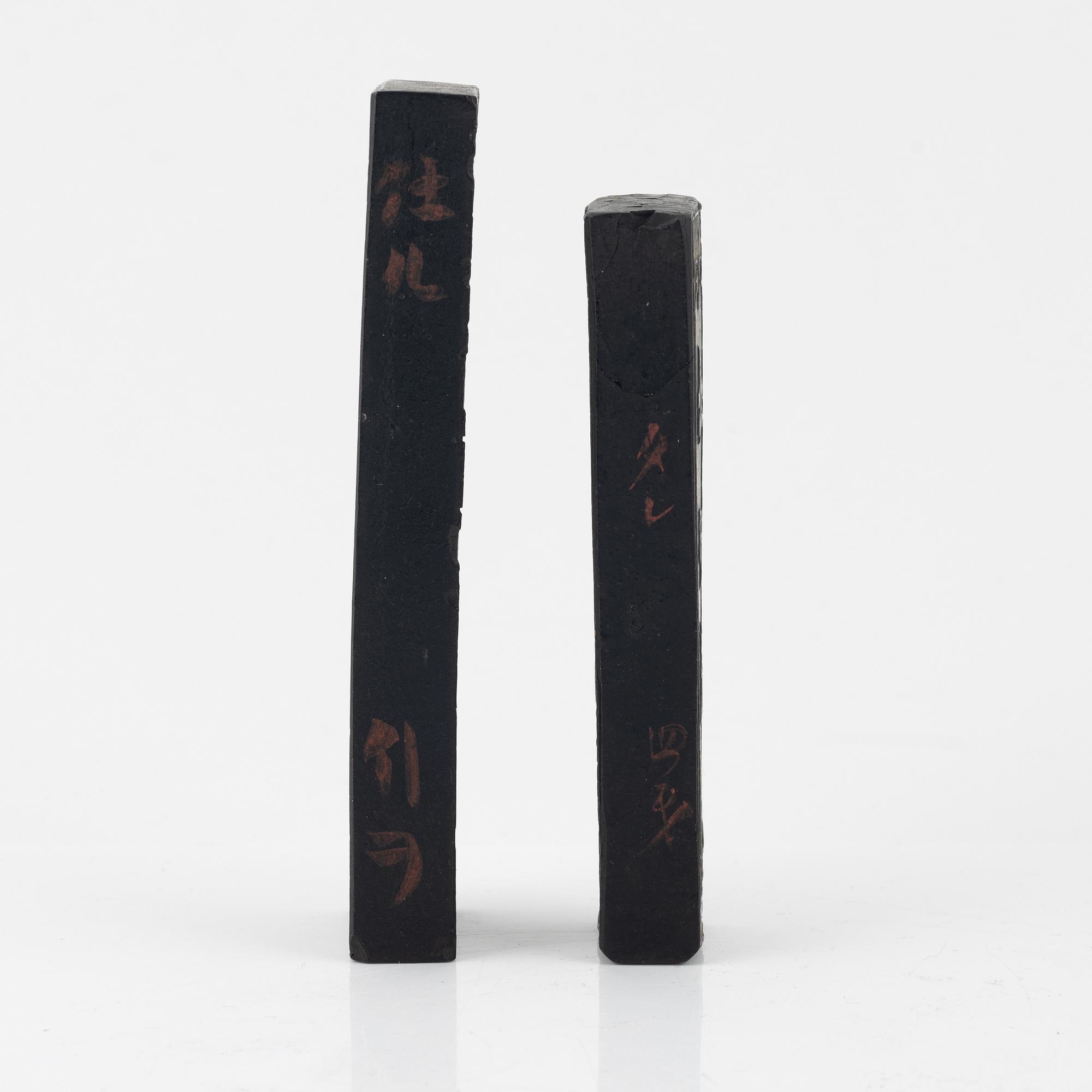 A set of four stone scholars objects and a enameled silver box with cover, Qing dynasty, circa 1900.