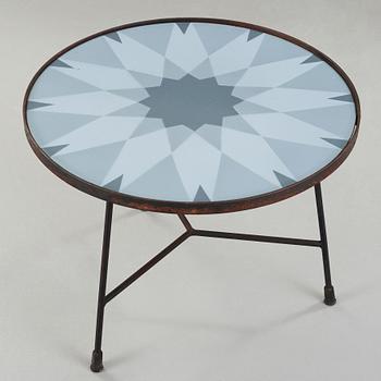 Kerstin Hörlin-Holmquist, an enamelled top table on an iron base, Nordiska Kompaniet, Sweden 1950's.