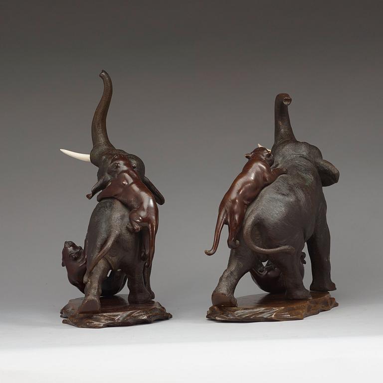 A pair of Japanese bronze sculptures of elephants, late Meiji (1868-1912).