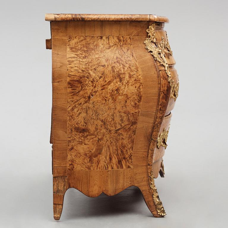 A burr-alder and gilt brass-mounted rococo commode by J. Sjölin (master 1767-1785).