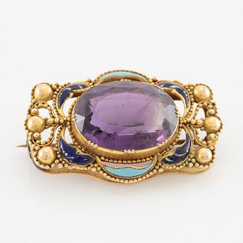Brosch, 15K guld med ametist och emalj.