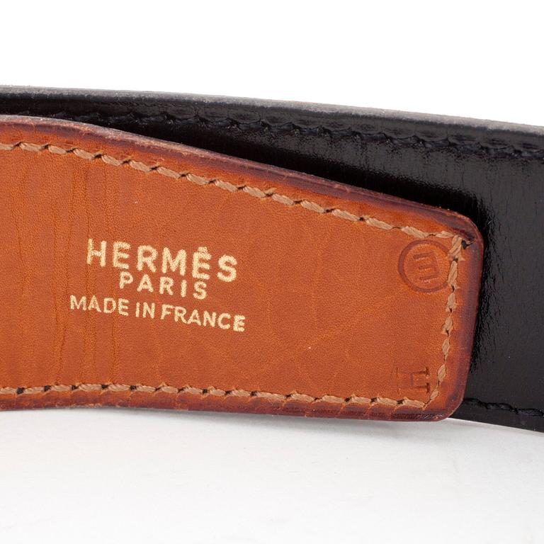 HERMÈS, a brown leather belt from the 1970s.