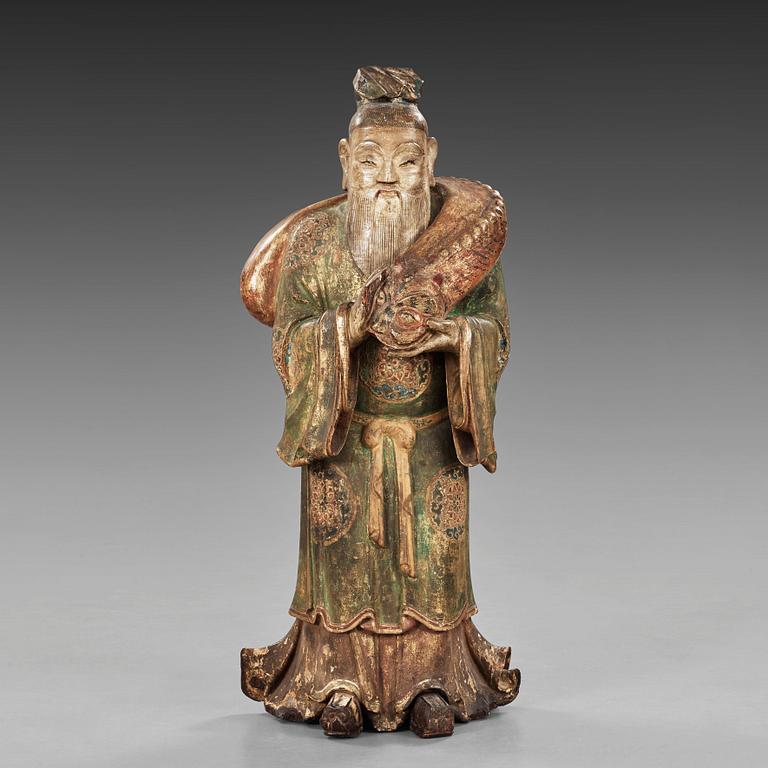 A large wooden scultpure of a daoist dignitary, 17/18th Century.