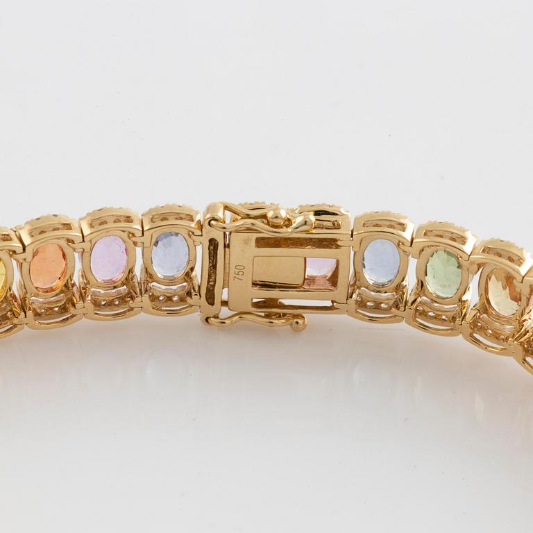 Armband med ovala multifärgade safirer och små briljantslipade diamanter.