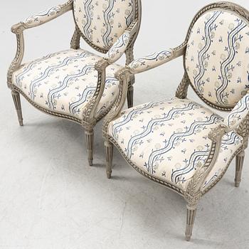 A pair of Gustavian style armchairs, 20th century.