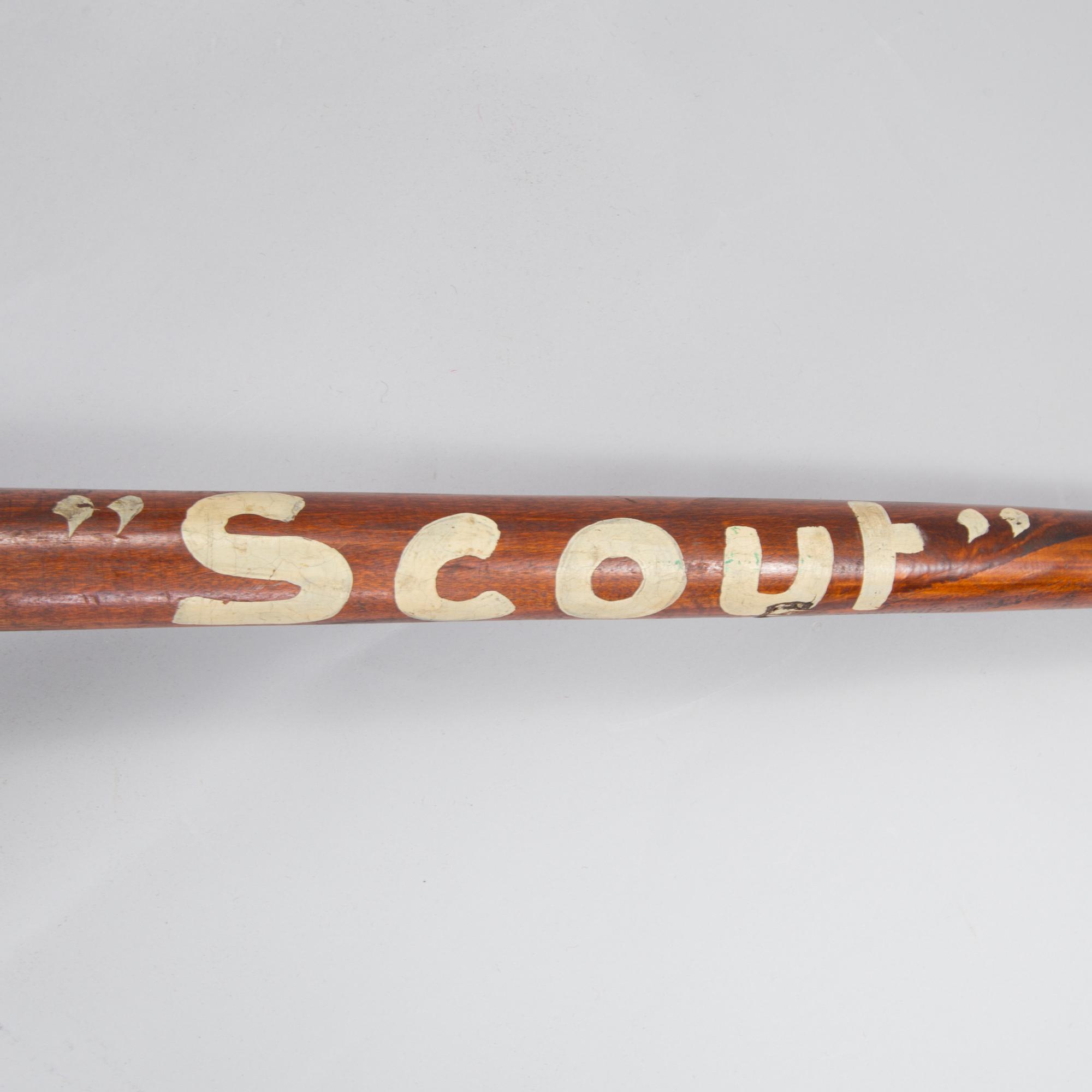 A 20th century wood pogo stick.