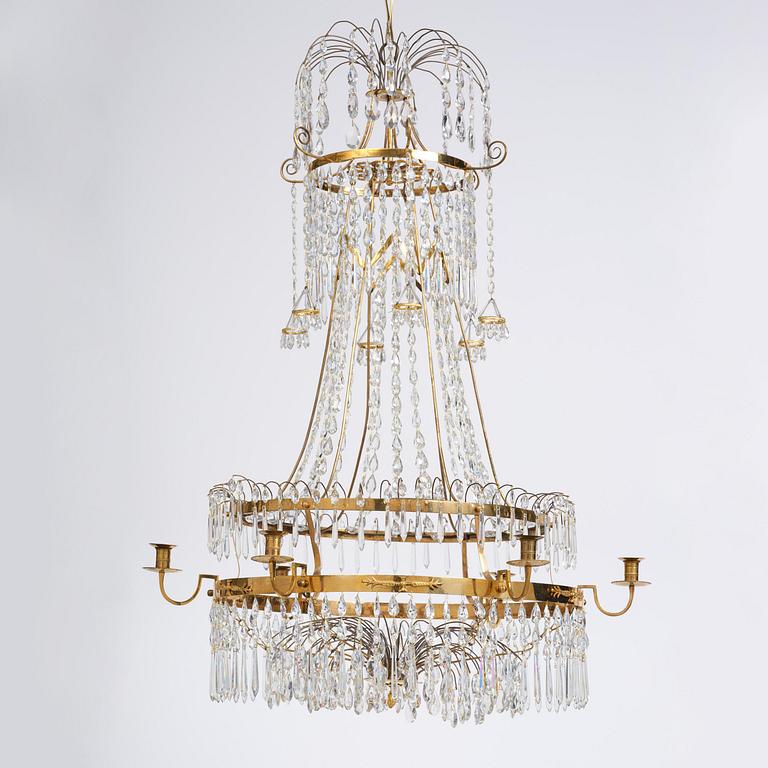 A late Gustavian gilt brass and cut glass seven-light chandelier, Stockholm, late 18th century.