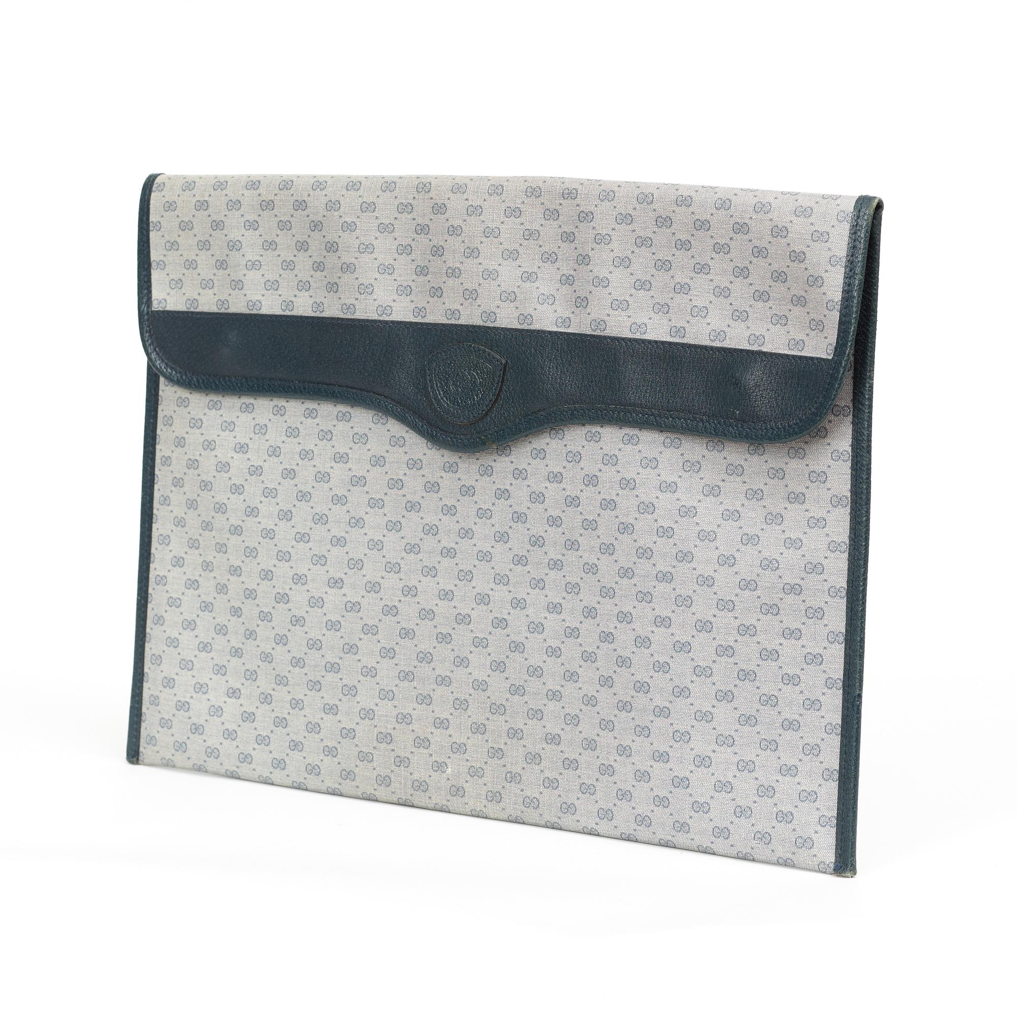 A 1990s document case by Gucci.