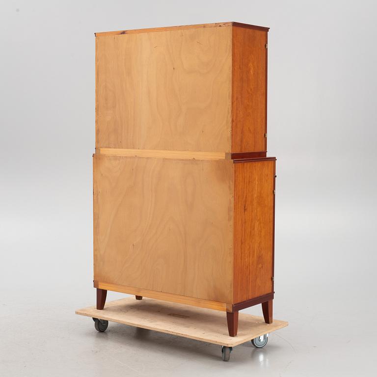 Carl Malmsten, a mahogany-veneered cabinet, AB J.O. Carlsson Möbelindustri, Vetlanda, sweden, around mid 20th century.