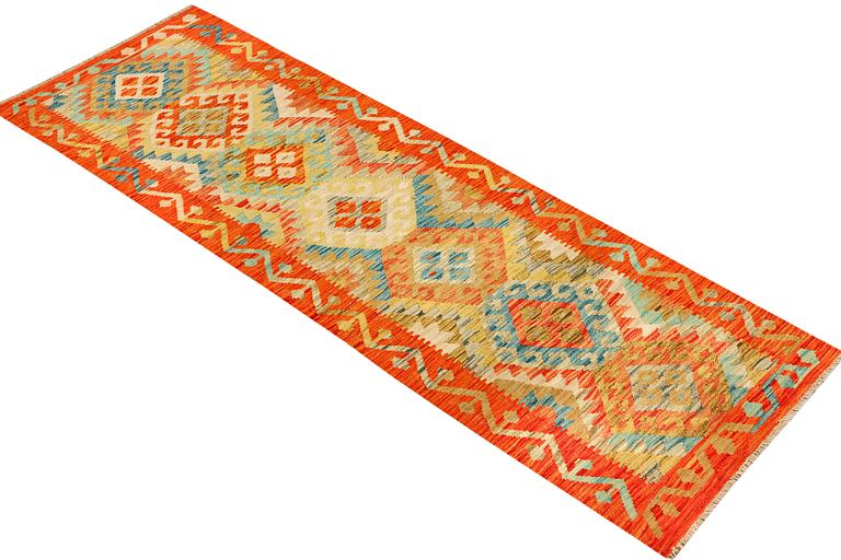 A Kilim runner, c. 253x73 cm.