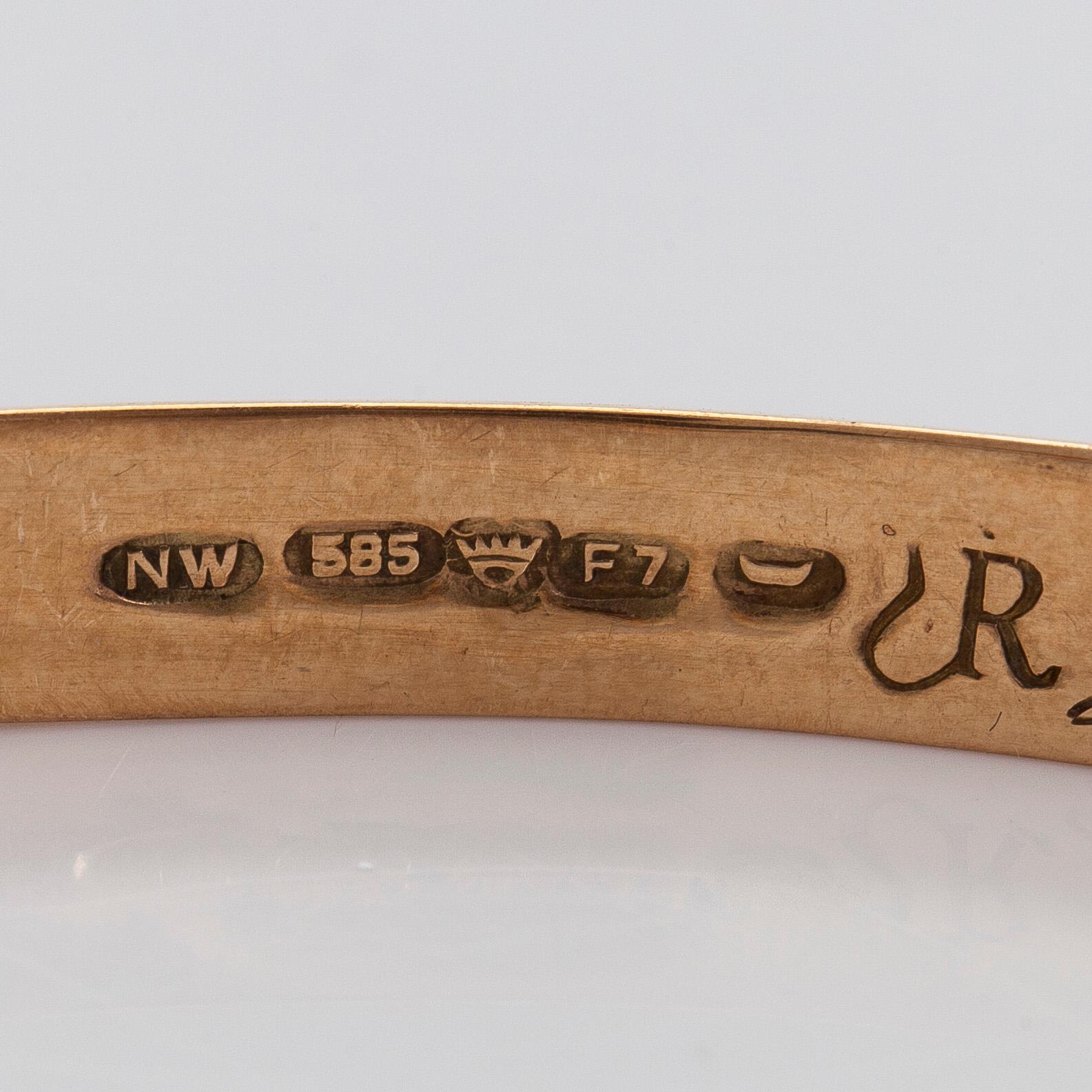 Eero Rislakki, armband, 14K guld och tigeröga, Westerback Helsingfors 1957.
