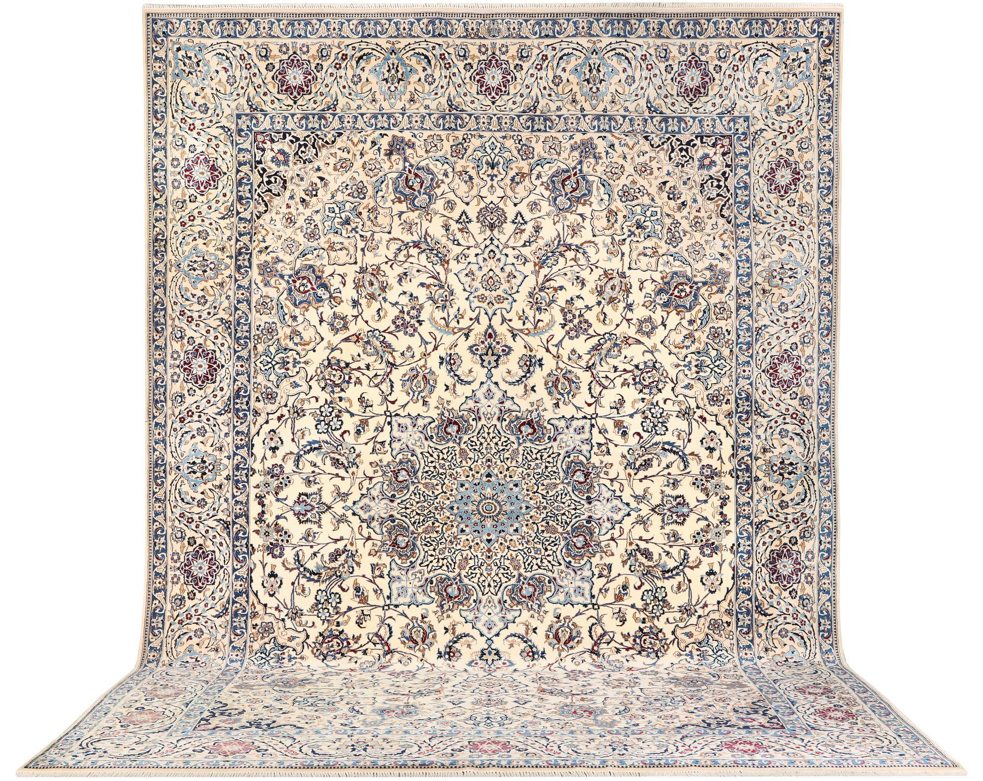 A Nain, part silk carpet, c. 474 x 322 cm.