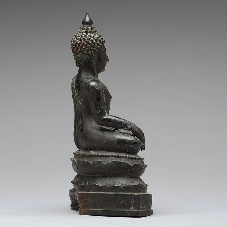 A bronze sculpture of a seated buddha, Thailand, presumably Lanna, 18th Century.