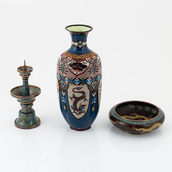 A Chinese cloisonné vase, a bowl and a candlestick, 20th Century.