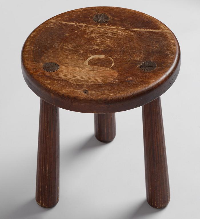 Axel Einar Hjorth, a stained pine "Skoga" stool, Nordiska Kompaniet, Sweden, 1930s.