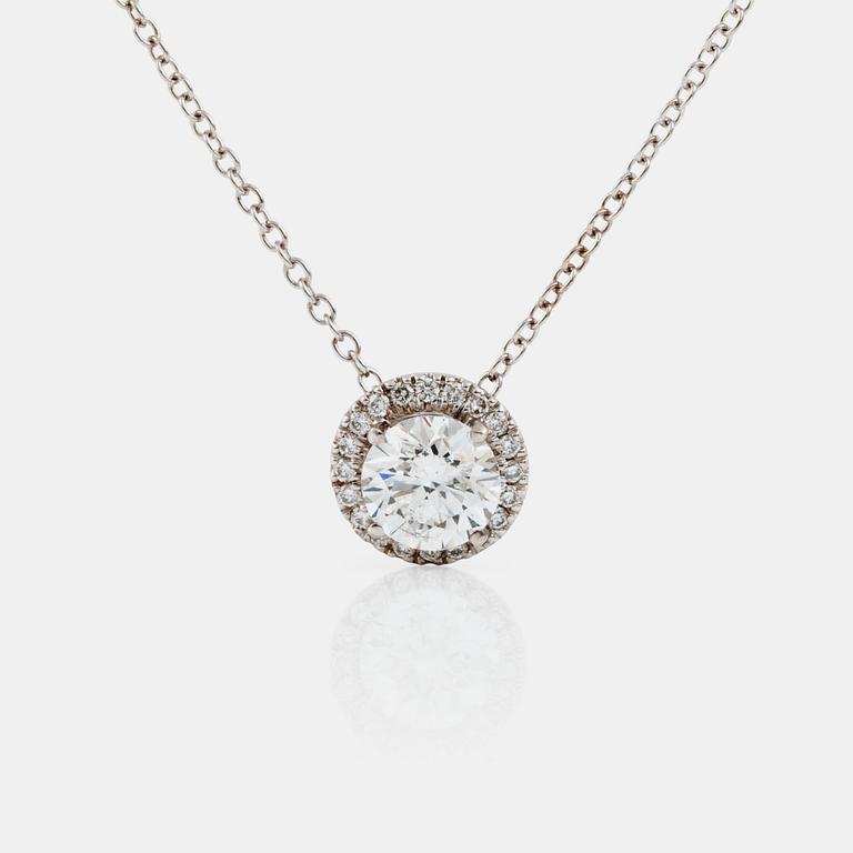 A brilliant-cut diamond, 1.03 cts, circa G/SI2, pendant on chain.