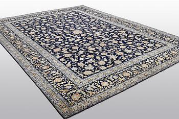 A carpet, Kashan, ca 416 x 304 cm.