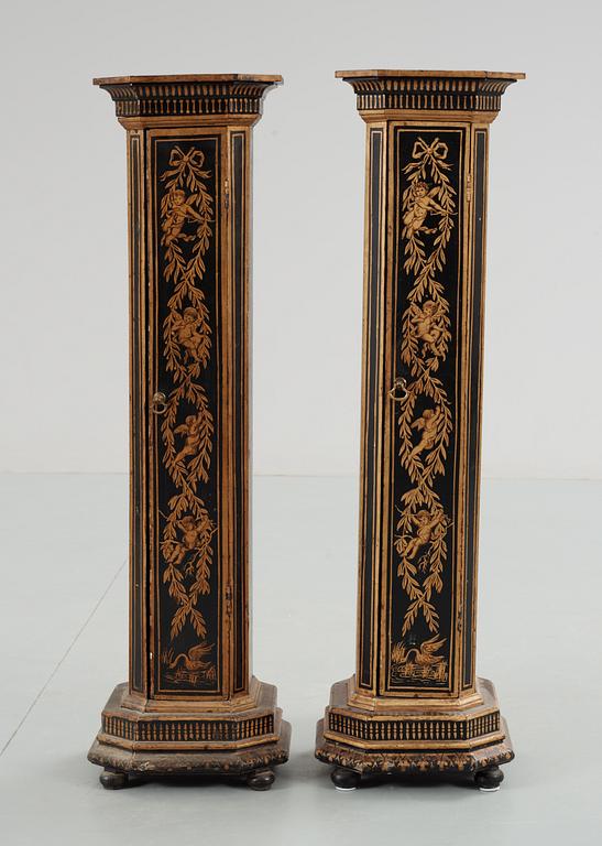 A pair of late 19th century pedestal cupboards.