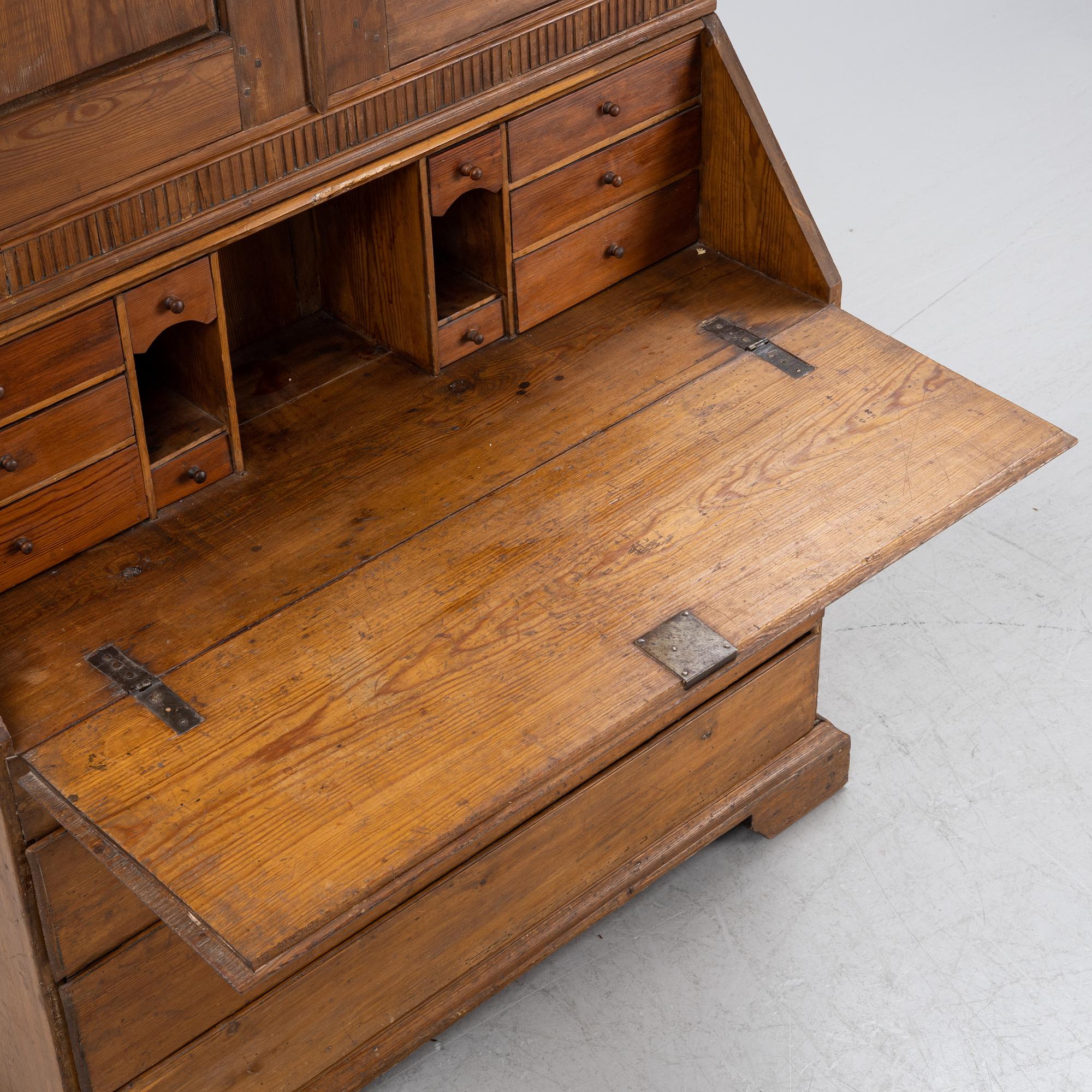 An 18(19th century pinewood  writing cabinet.
