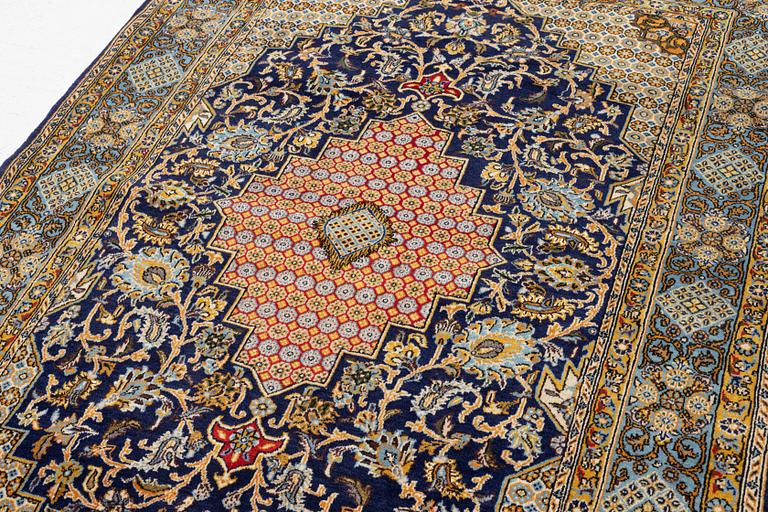 A Ghom/Shahreza rug, c. 202 x 140 cm.