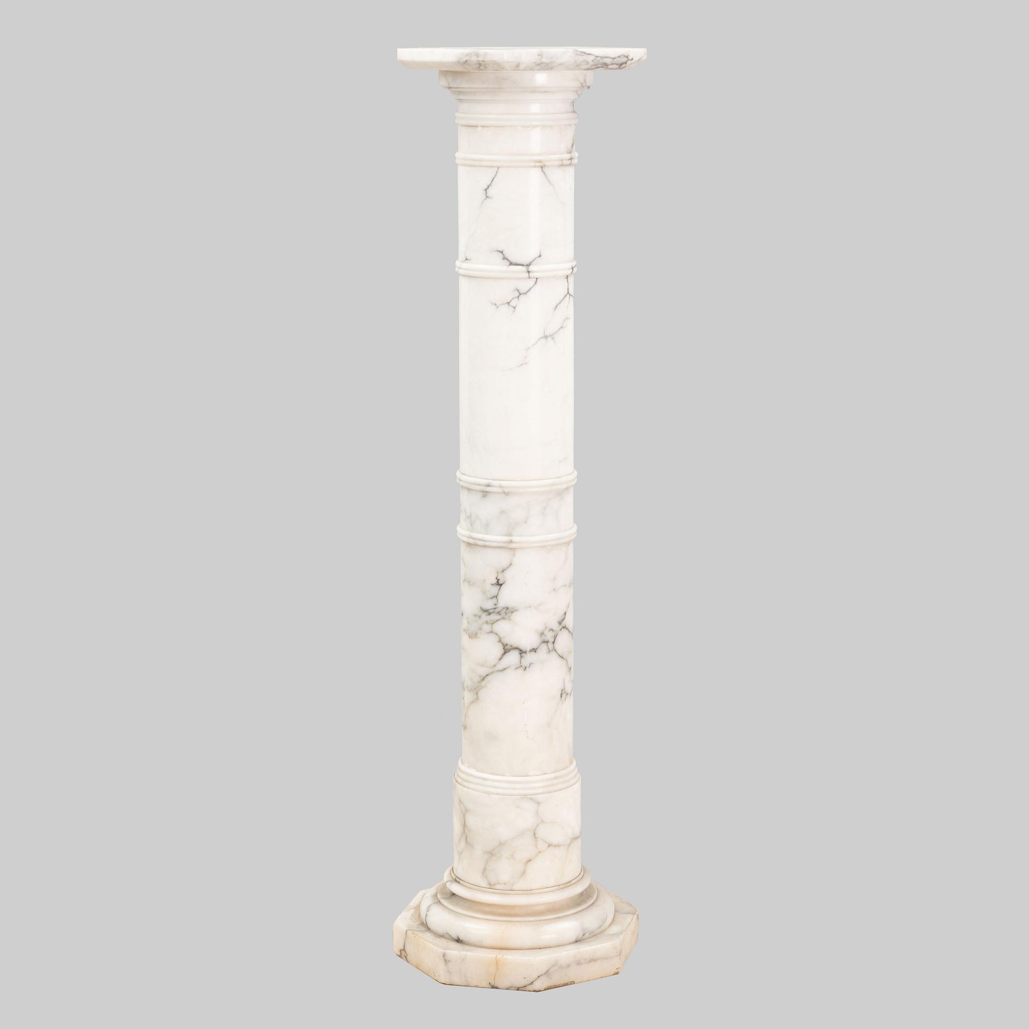 A marble pedestal, early 20th Century.