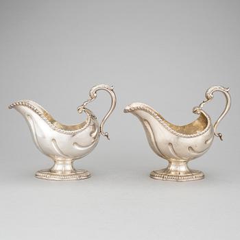 A PAIR OF SAUCE BOATS, silver, London1764. Weight 1017 grams.