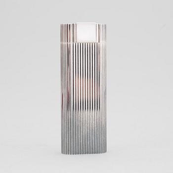 A must de Cartier silver plated cigarette lighter.