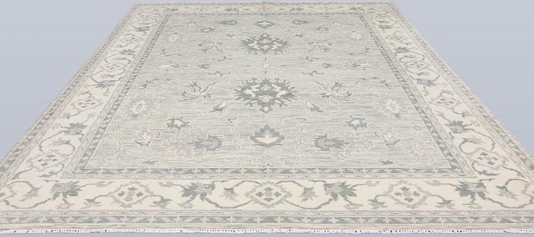 A rug, Ziegler design, approx. 368 x 279 cm.