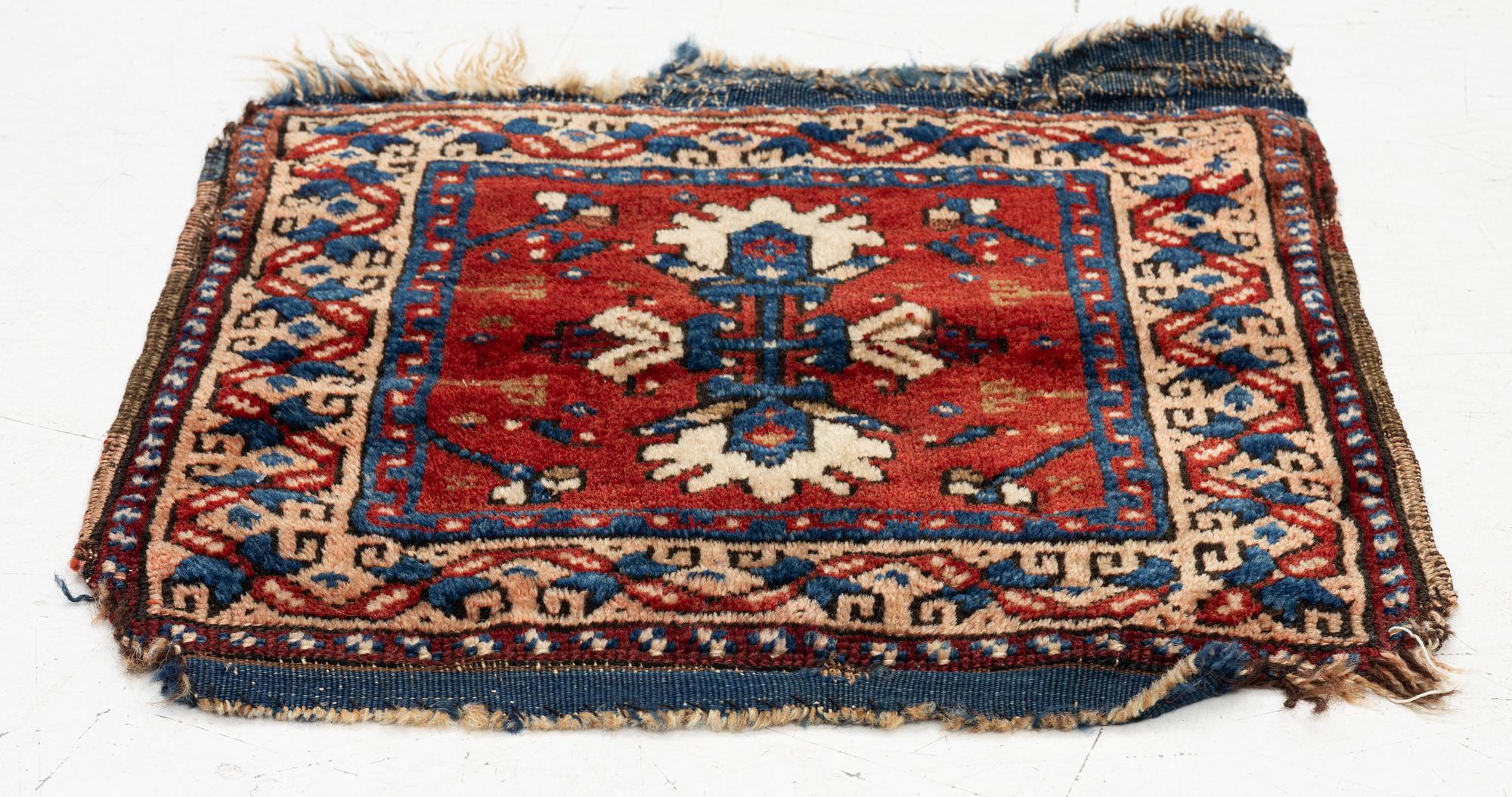 An Antique Saddlebag, so-called Heybe, Anatolia, c. 47 x 45 cm.