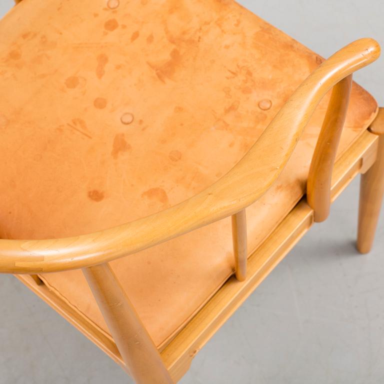 A Hans J Wegner 'Kinastolen' armchair, Fritz Hansen, Denmark 1971.