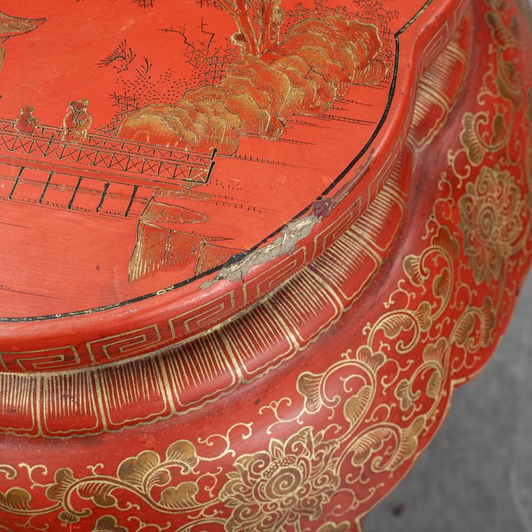 A Chinese red lacquered stool, early 20th century.