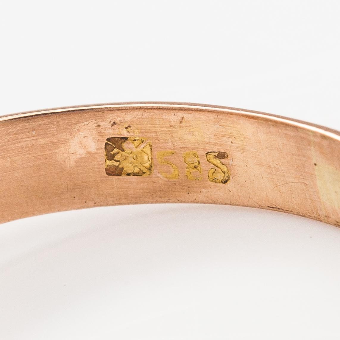A 14K gold ring with a ca. 0.66 ct old-cut diamond.