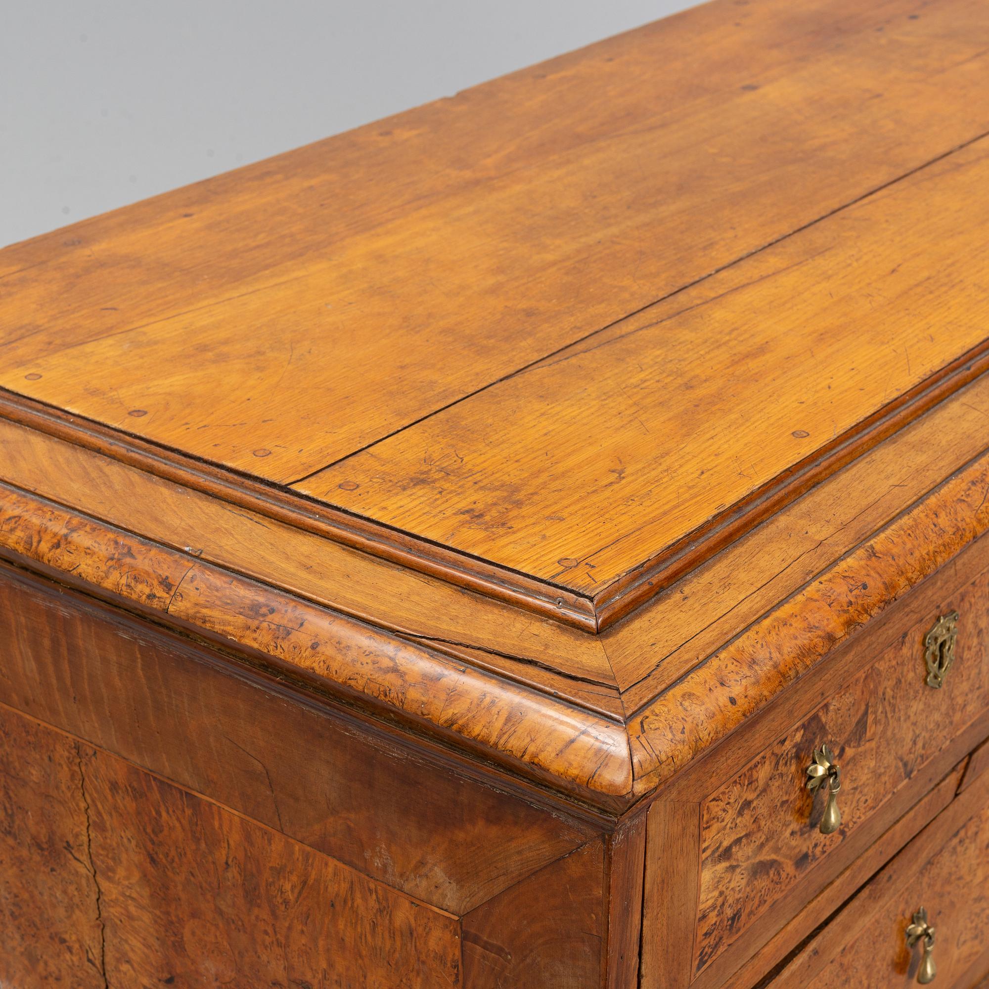 A Swedish root veneered late baroque chest of drawers, first half of the 18th century.