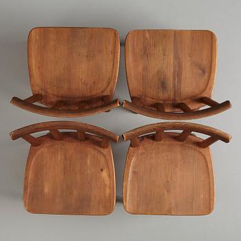 Axel Einar Hjorth, a set of four stained pine "Utö" chairs, Nordiska Kompaniet, Sweden 1930s.