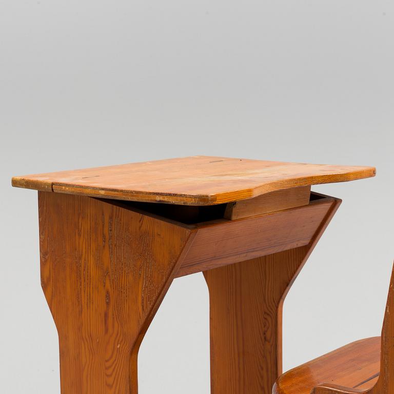 A first half of the 20th century school bench.