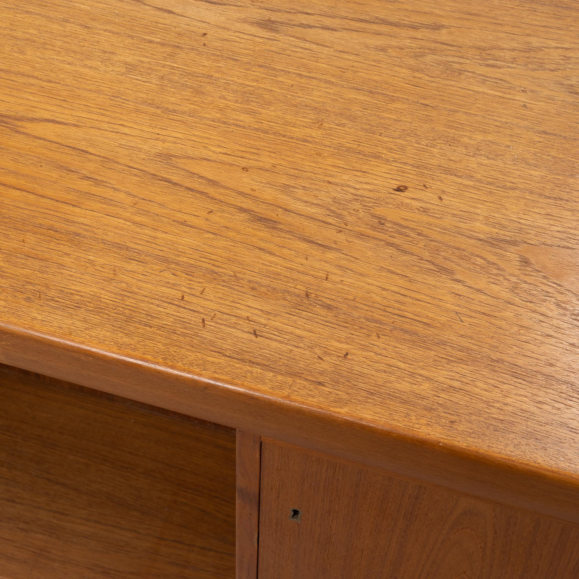 A teak 1950's/60's writing desk.