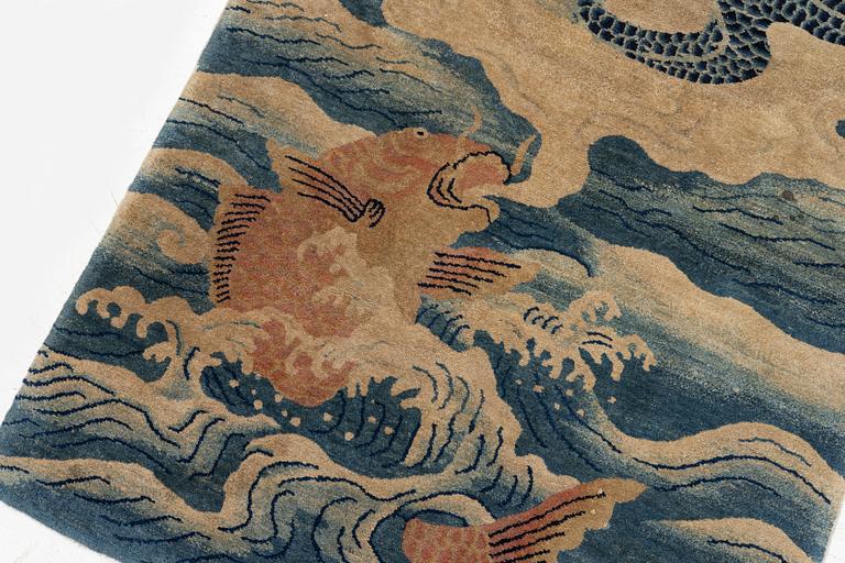 An antique Baotou rug, northern China, late Qing dynasty, circa 1900. c. 178x90 cm.