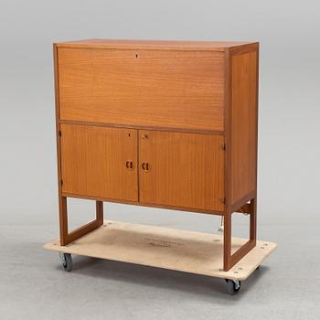 A second half of the 20th century teak veneered bar cabinet by Arne Wahl-Iversen, IKEA.