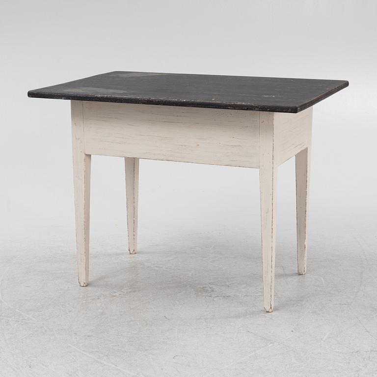 A painted table, 19th Century.