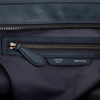 Céline, a teal leather 'Luggage' handbag.